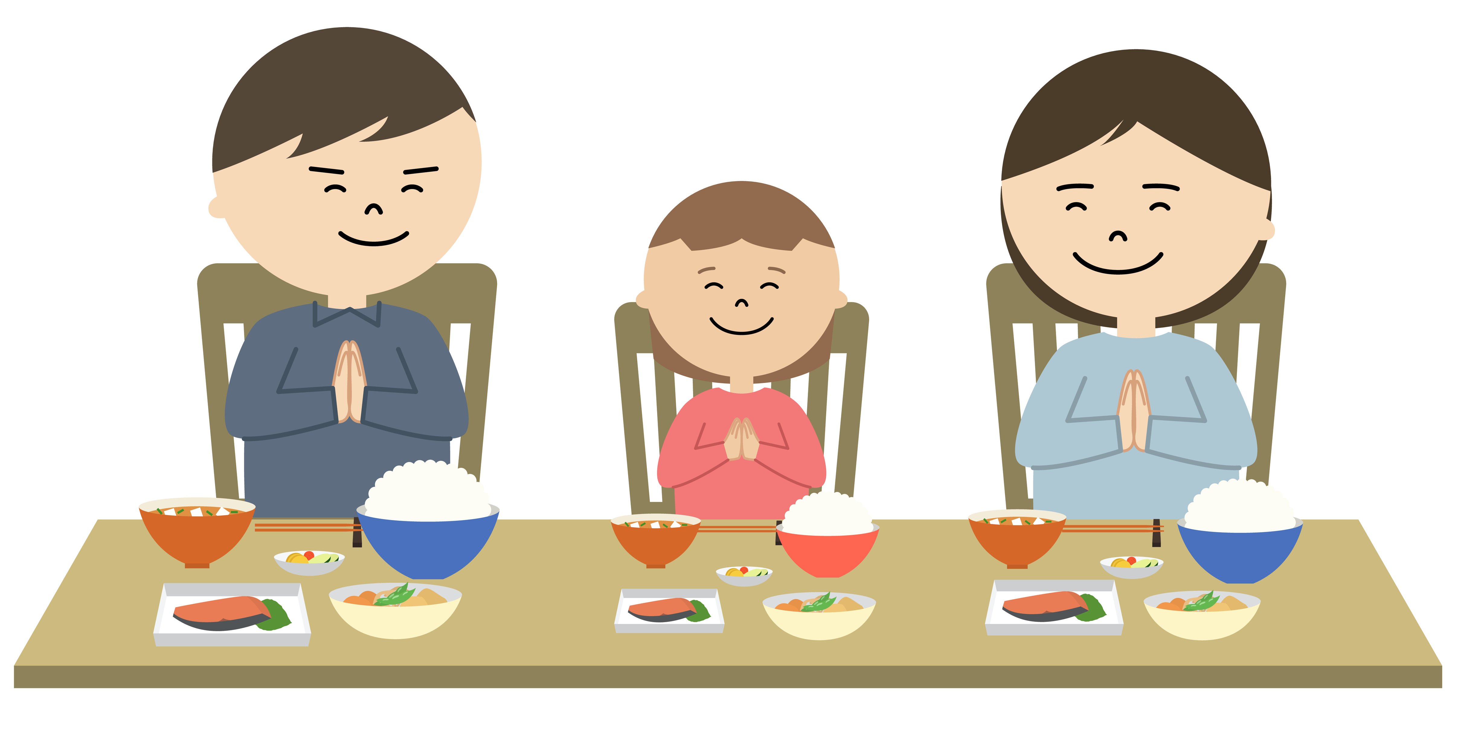 家で一緒に食事をしている（いただきますを言っている様子） 